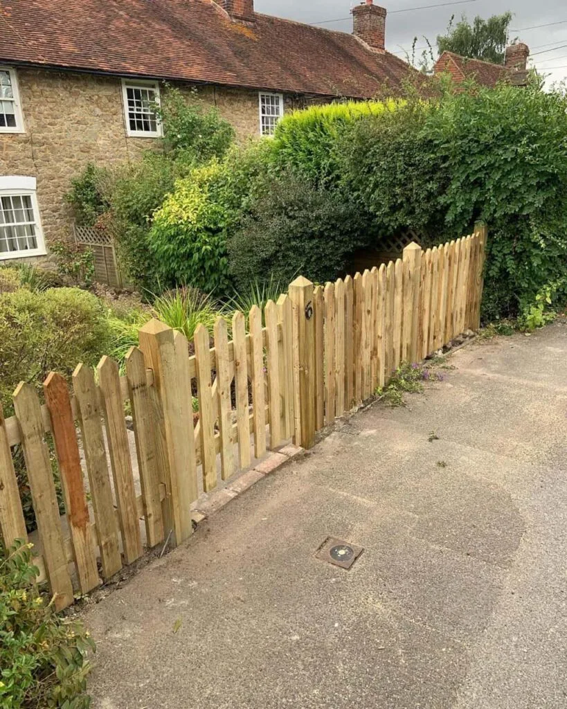 This is a photo of a picket fence and picket gate installed by Fast Fix Fencing Tonbridge
